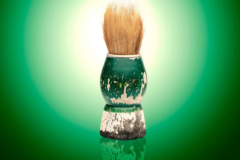 Assortment of premium beard brushes made from wood, bamboo, and sustainable materials